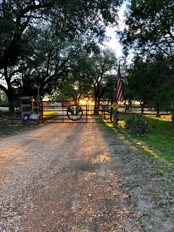 Driveway and gate to ranch